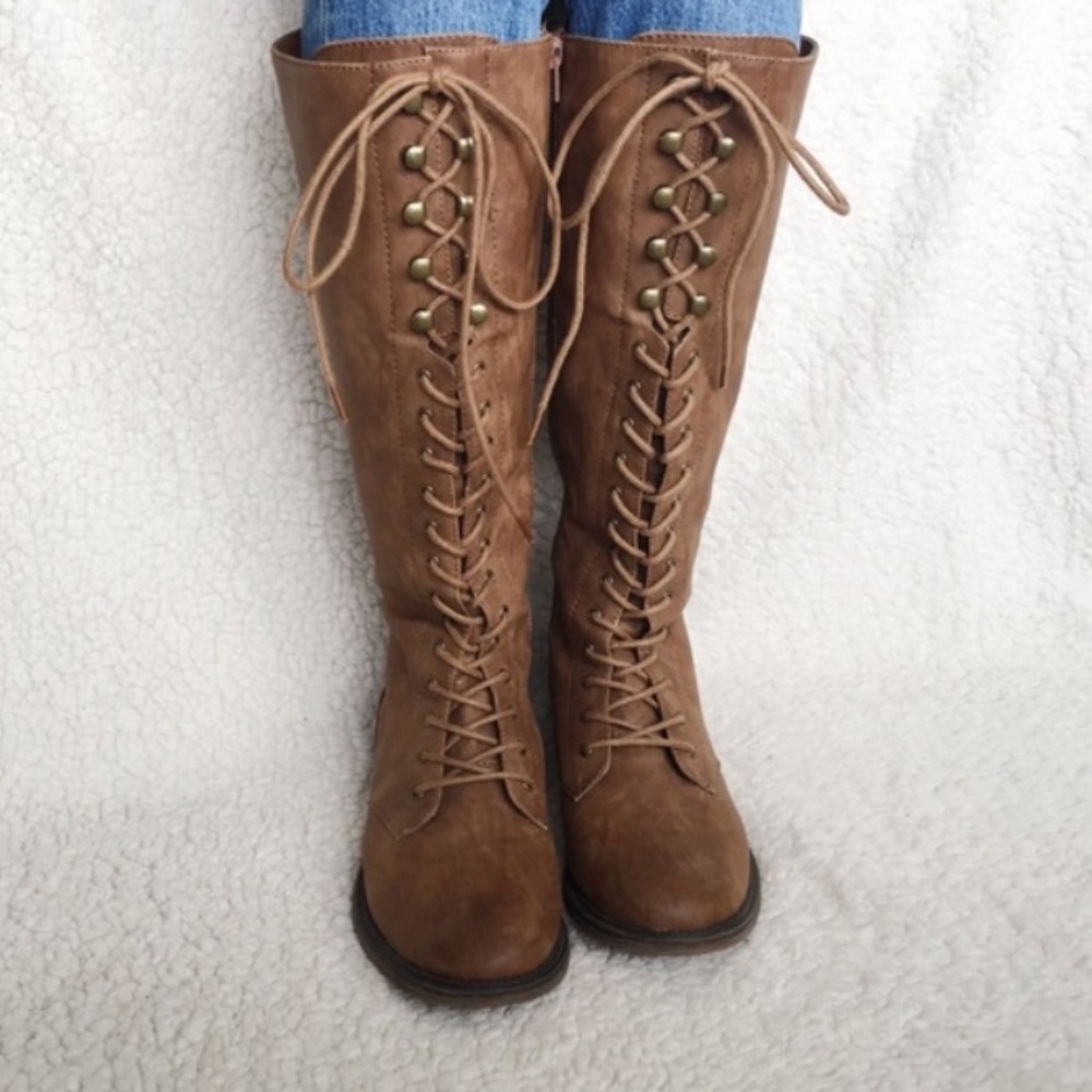 Tall brown lace-up boots
